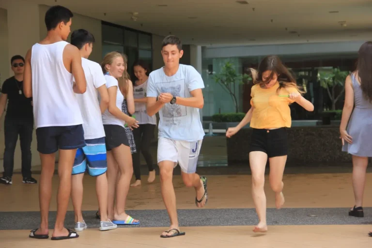 A boy and girl running