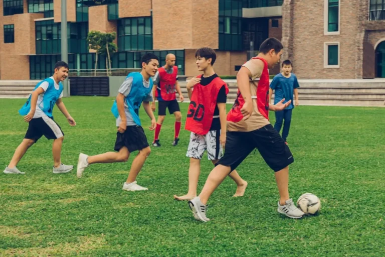 Teens Playing Football